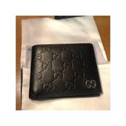 Gucci GG Embossed Wallet